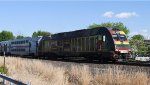  NJT 4508 with its Black History Month wrap leads NJT train 5431